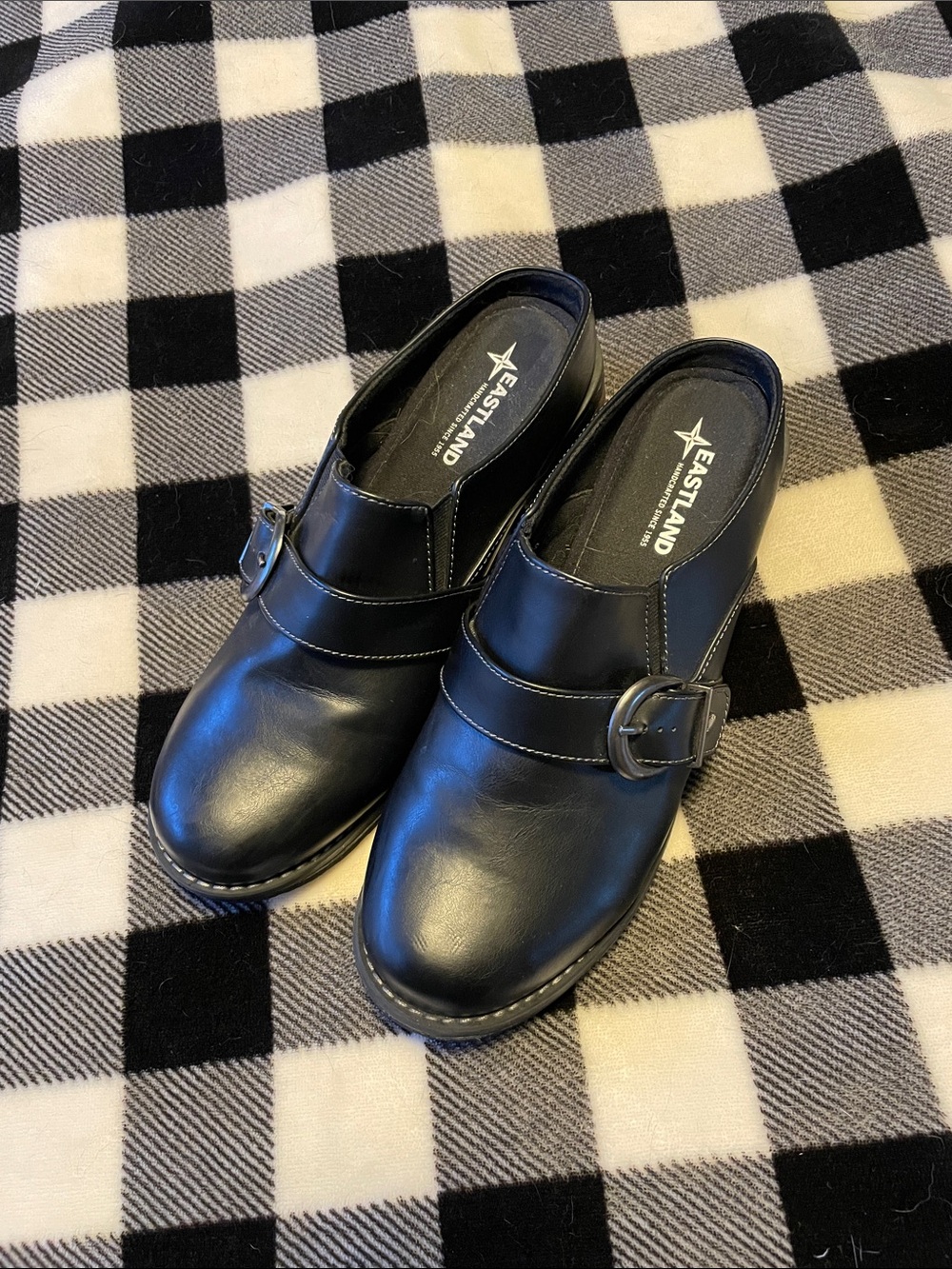 Eastland Black Leather Slip-On Mules with Buckle Detail